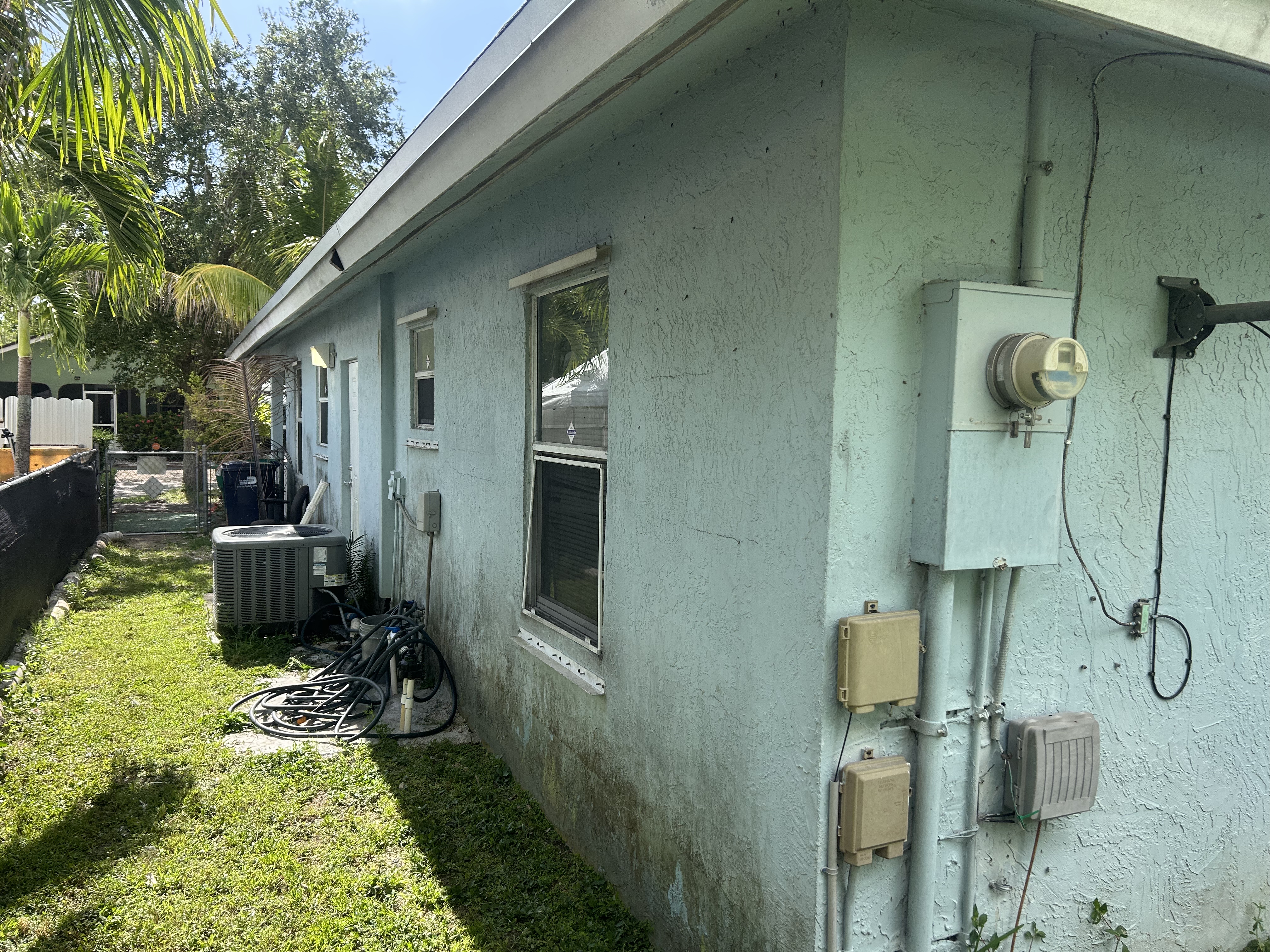 Before: faded, weathered exterior paint