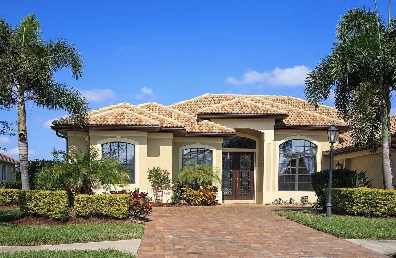 Mediterranean-style home with fresh exterior paint